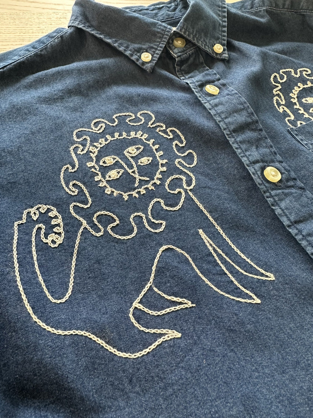 Close-up of the chainstitched lion by Emily Counts