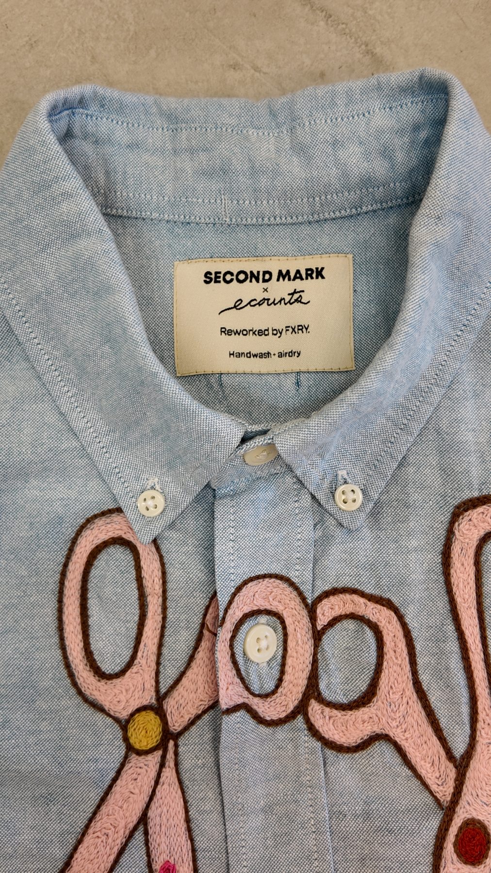 Second Mark x ecounts label in the collar