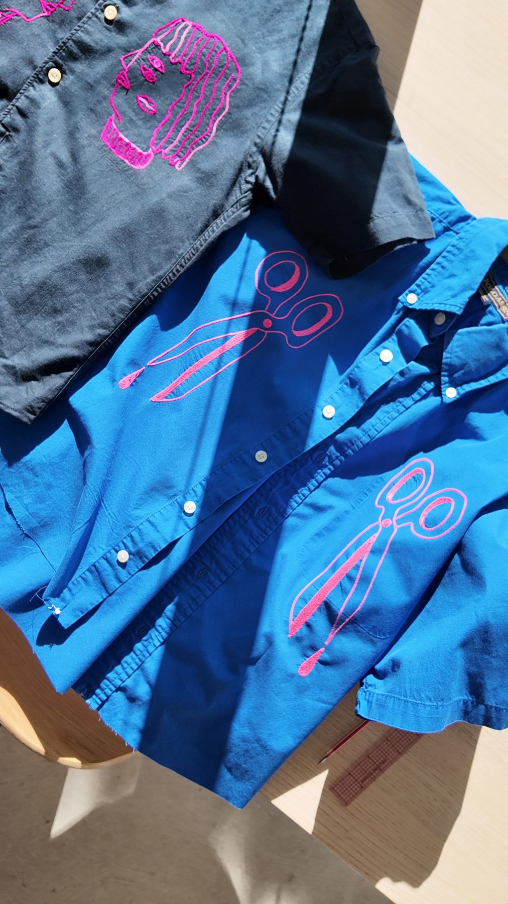 Cobalt scissors shirt in sunlight