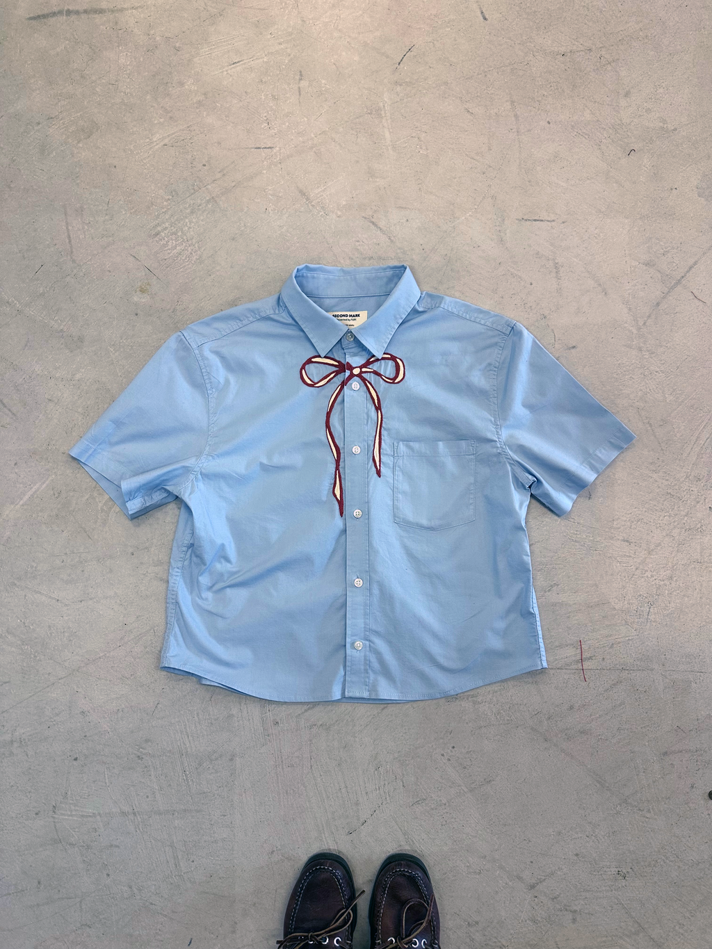 Cropped Short Sleeve Button Down — Light Blue with Red and Gold Bow · S/M