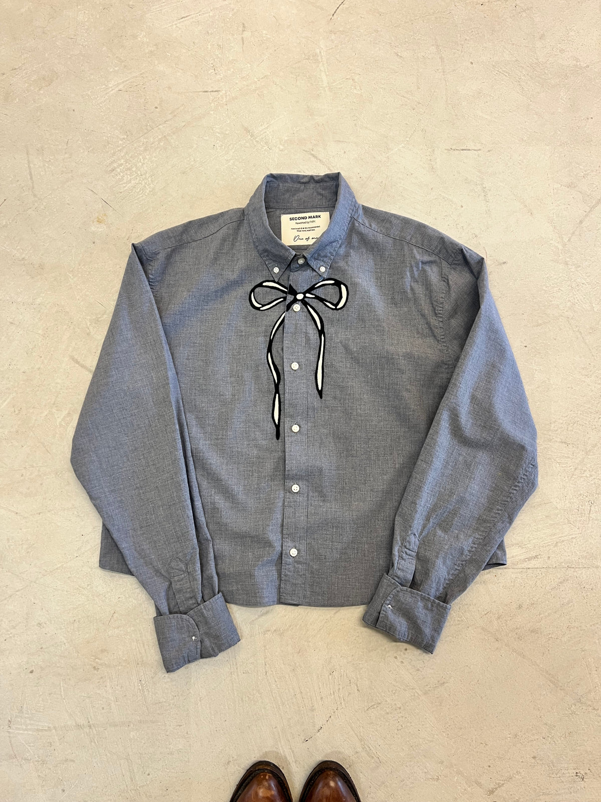 Cropped Long Sleeve Button Down — Grey with Black and Ivory Bow Across Chest · M/L