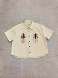 Apples shirt laid flat