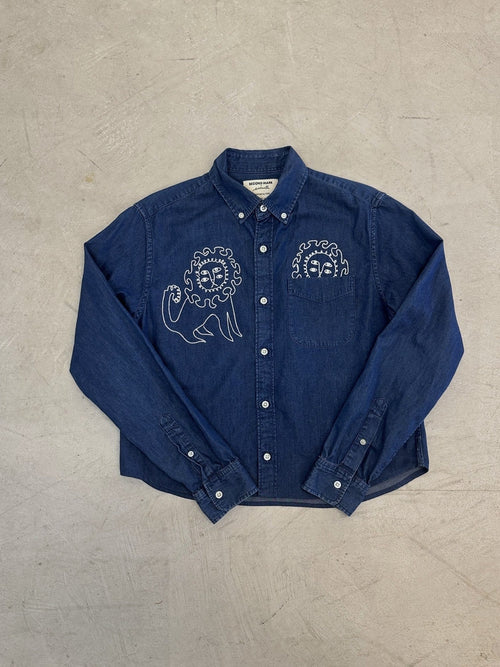 Dark chambray shirt with chainstitched lions by Emily Counts