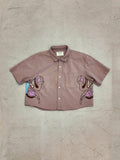 Moth shirt laid flat