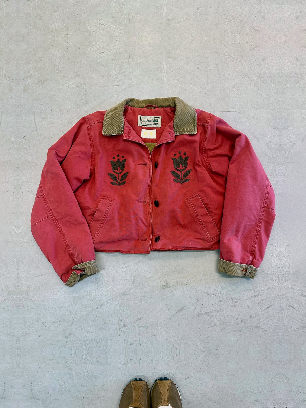 One-of-one vintage LL Bean barn jacket in vintage red with hand-chainstitched heather brown tulip embroidery on the chest