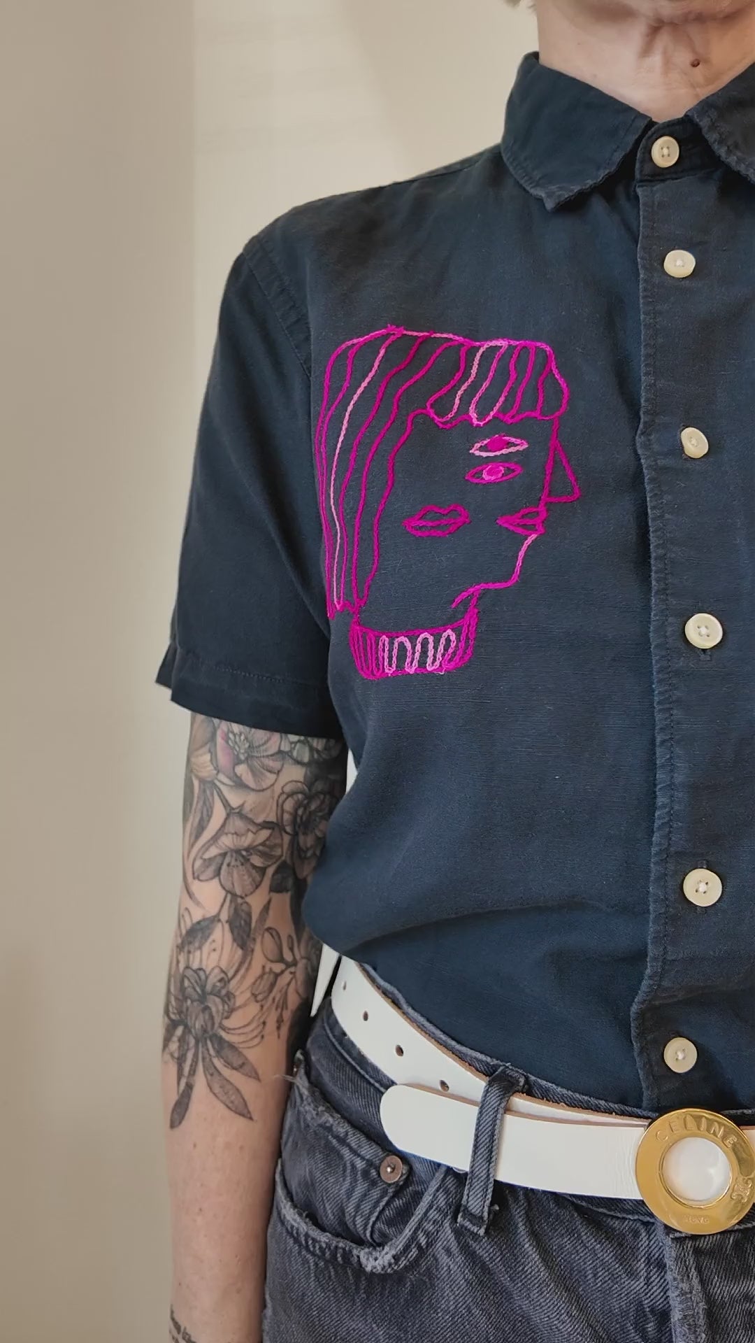 Try-on of the Emily Counts faces shirt