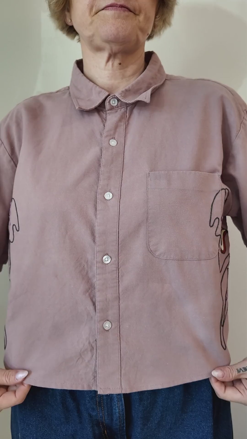 Try-on of the Emily Counts moth shirt