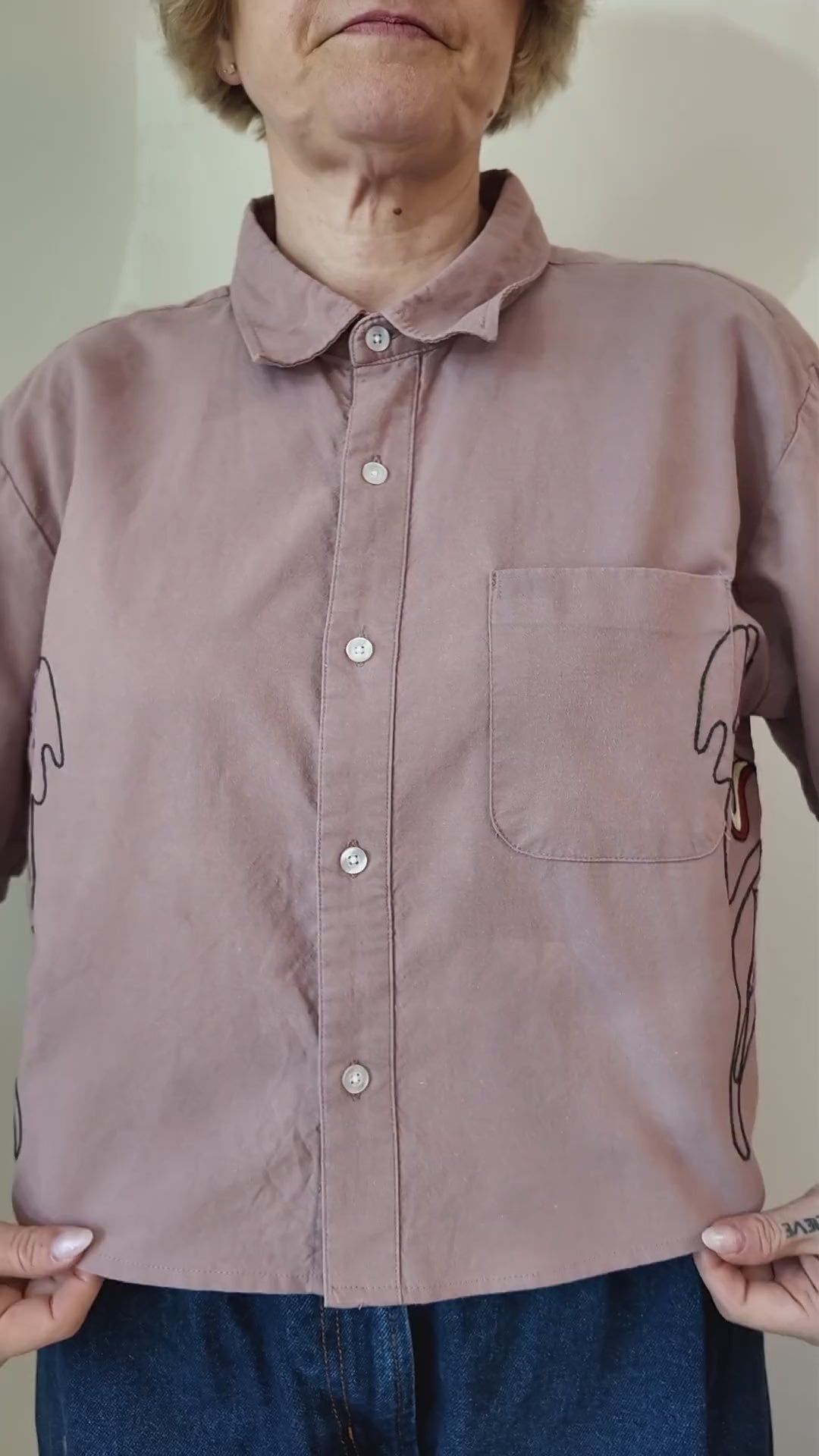 Try-on of the Emily Counts moth shirt